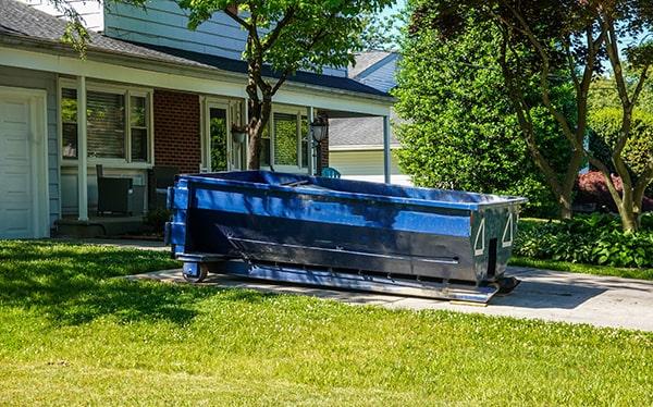 residential dumpsters can be placed on a driveway or lawn, but safety measures should be taken to avoid damage to the property